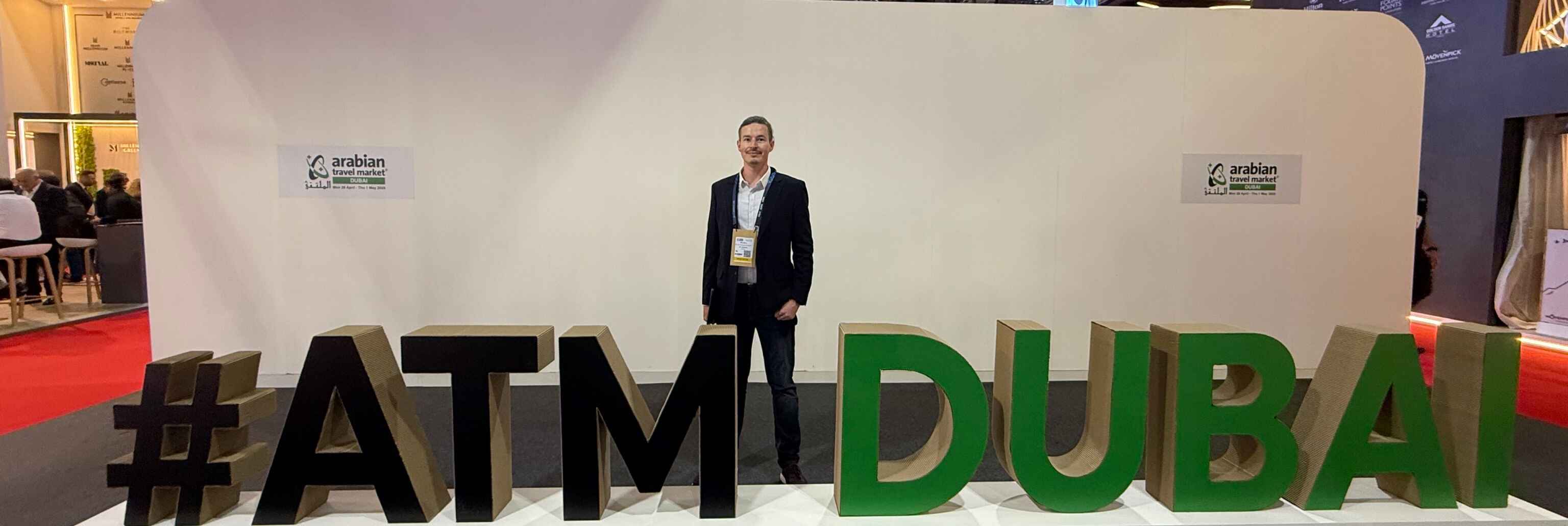 Niko Miron with ATM Dubai logo