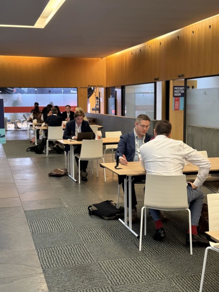 Attendees sitting at tables at Phocuswright Europe 2025