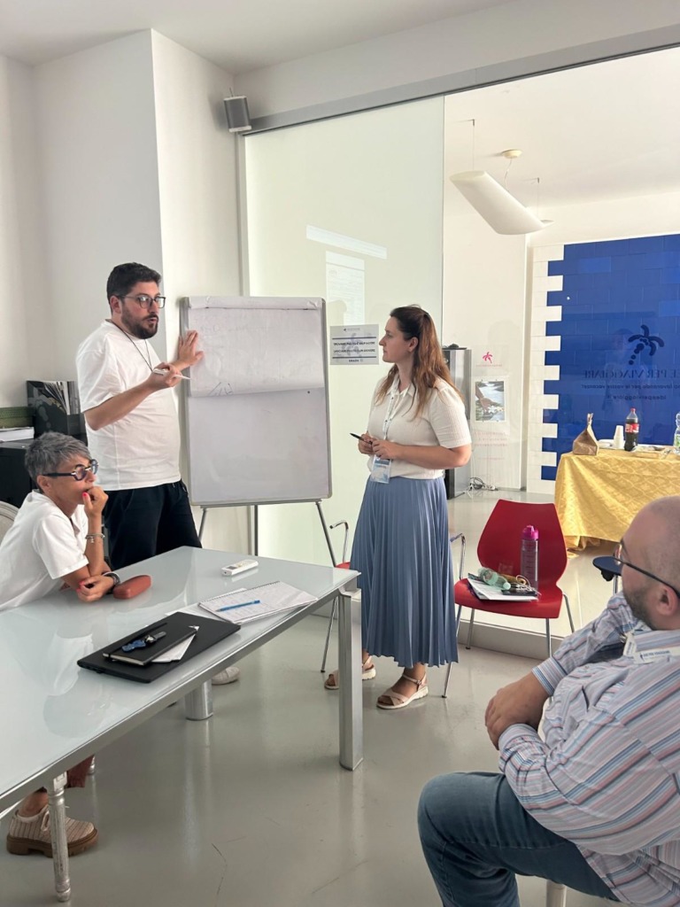 Gp solutions team and idee per viaggiare representative during training sessions and discussions