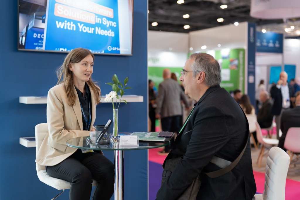 Business development Manager of GP Solutions talking to a visitor at WTM 2025 exhibitor stand
