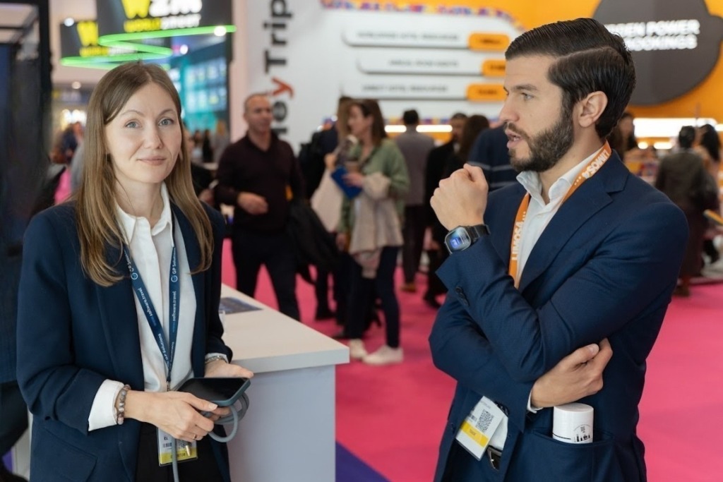 Business development Manager of GP Solutions talking to a visitor at WTM 2025 exhibitor stand