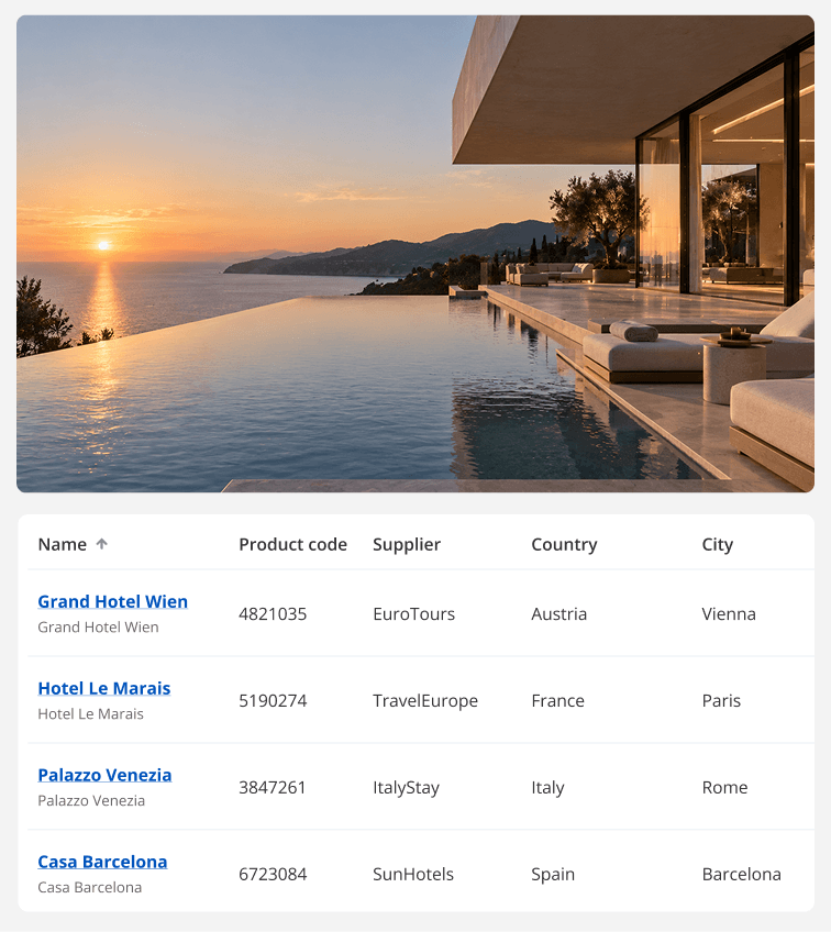 Sunset over a modern seaside infinity pool with a glass-walled lounge and ocean view, at a luxury resort.